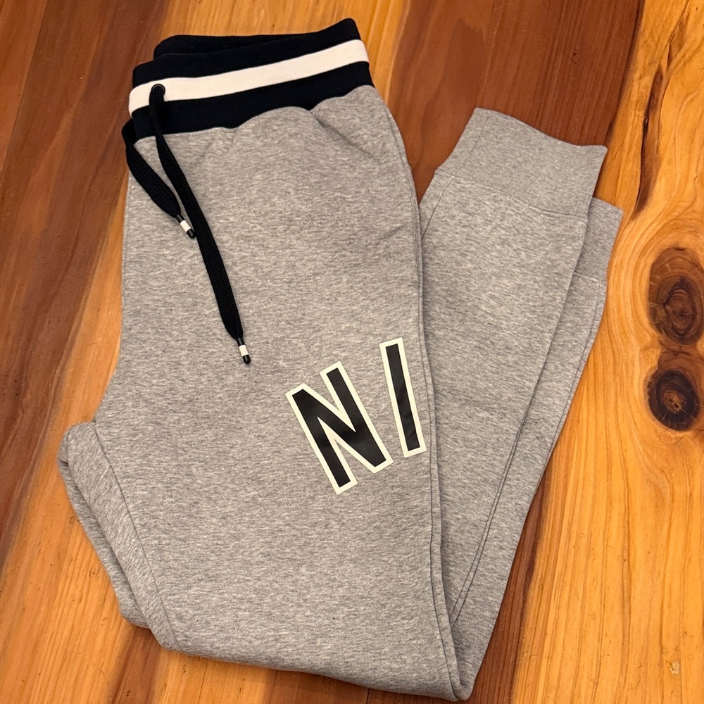Nike Gray Track Joggers with Black Waistband and Drawstring